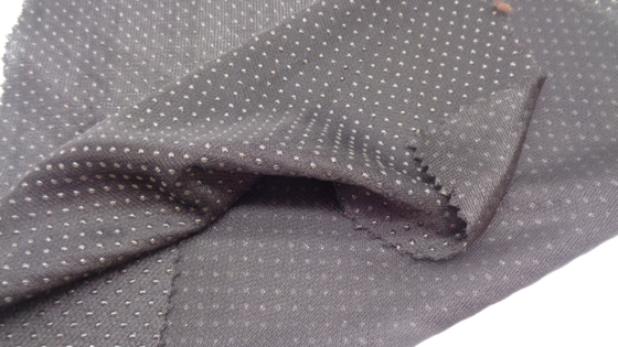 Breathable 100% Polyester Plain Dot Bonded Garment Fabric 30dx30d